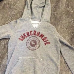 A grey hoodie from Abercrombie (Kids)